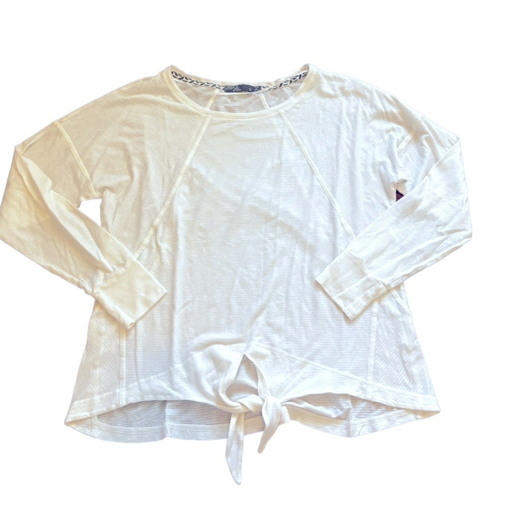 Prana white long sleeve shirt with tie in front. Women’s size small.